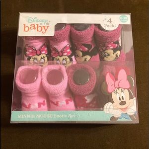 Brand new Disney sock/bootie set. Size 0-12 months